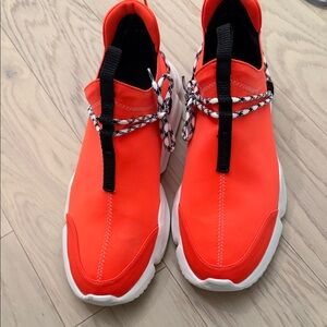 Vibrant Red Sneakers with Black Accents
